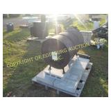 VOGELZANG WOOD BURNER ON CINDER BLOCKS