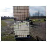 (2) 300 GALLON CAGED POLY TOTES