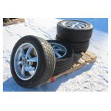 (4) 275/55R20 TIRES ON 6-BOLT ALUMINUM SPORT