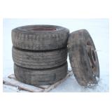 (4) 315/80R22.5 SEMI TIRES ON 10-BOLT STEEL RIMS