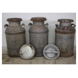 (3) VINTAGE MILK CANS AND (5) LIDS
