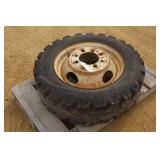 (1) 8.00-16.5LT TIRE ON 8-BOLT DUALLY RIM