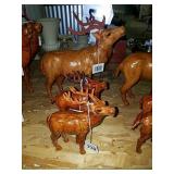 leather moose figurines - 2 large, 2 small