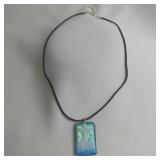 Cross Design Dichoric Glass Pendant On Braided
