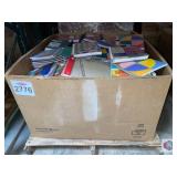 assorted school supplies note books, journals