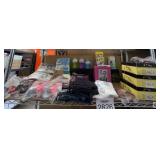 assorted baby clothing, socks, pants, munchkin