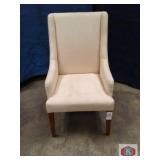 high wing back chair with plush upholstered back,