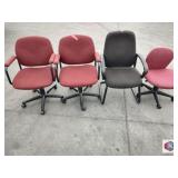 3 task chairs pink color, one side chair black,