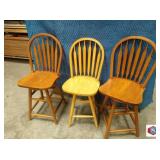solid oak swivel stools Two oak darker finish.