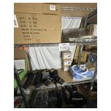 Assorted Items Pictured On Shelf