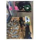 Assorted Outdoor Items: Decor and Hoses