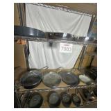 Assorted Pots and Pans Pictured on Shelf