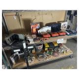 Assorted Items Pictured: Battery Chargers,
