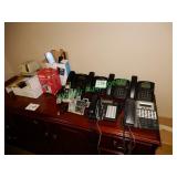 (8) Assorted multi line telephones in group