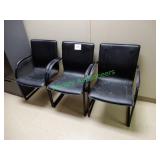 (3) Black matching arm chairs
