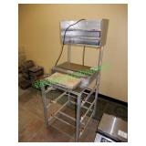 Heat seal food wrapping station