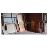 Assorted Particle Board/Plywood on Wall Assorted Particle Board/Plywood on Wall