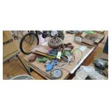 A variety of mechanical parts, including pulleys, A variety of mechanical parts, including pulleys,