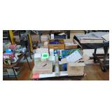 Assorted Refrigeration Components on Two Tables Assorted Refrigeration Components on Two Tables