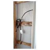 Grease Gun and Fuel Transfer Pump on Wall