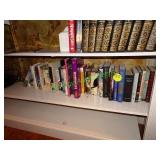 Assorted books on shelves