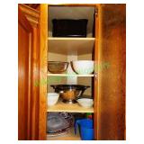 All dishes, trays, bowels & other in cabinet