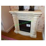 Electric faux stone fire place