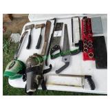 Assorted saws, axes, knee pads & more