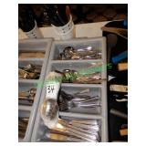 Assortment of flatware in group – includes knives