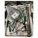 Assorted cooking and baking utensils in group –