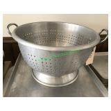 Heavy duty metal strainer with bass