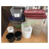 Assorted Rubbermaid tubs, measuring cups and