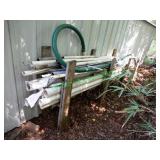 PVC Pipe in Group Behind Shed