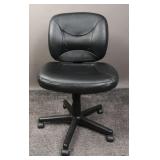 Black Faux Leather Swiveling, Tilting Office Chair