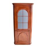 Cherry Stained Arched Door Corner Cabinet