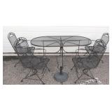 Wrought Iron Patio Set With Table and Four Chairs