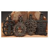 Four Vintage Cast Iron Trivets