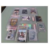 1 BAG WITH SIGNED SPORTS COLLECTIBLES