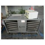 MOBILE SHELVING UNIT AND A MICROWAVE