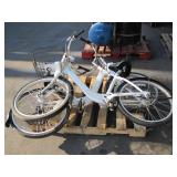 2 WHITE BICYCLES WITH BASKETS