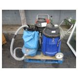 A PALLET WITH THREE VACUUMS
