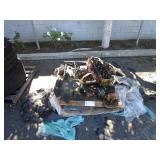 A PALLET WITH ENGINE PARTS