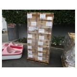A PALLET WITH BOXES OF ASSORTED AUTOMOTIVE PARTS