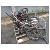 A PALLET OF ASSORTED BICYCLES