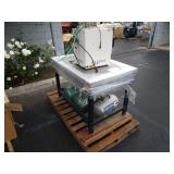 A PALLET WITH STAINLESS STEEL TABLE,