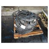 A PALLET WITH EXTENSION CORDS