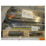 A PALLET WITH TILE CUTTERS