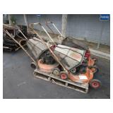 PALLET WITH 4 LAWN MOWERS
