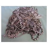 1 BAG W/SILVER TONE NECKLACES