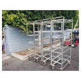 4 ROLLING METAL STORAGE RACKS 4 ROLLING METAL STORAGE RACKS